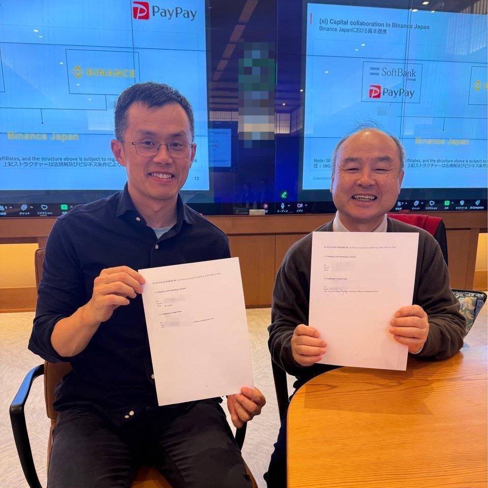 币安创始人赵长鹏与日本软银集团老板孙正义合影。